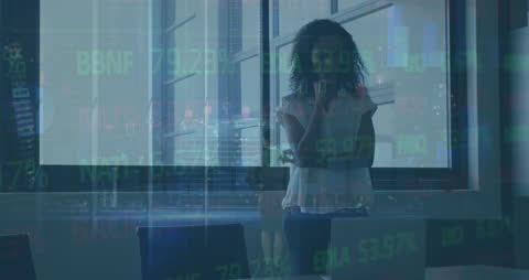 Woman Analyzing Stock Data in Modern Office