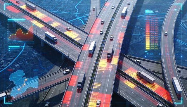Monitoring highway interchange with heatmap overlays showing traffic density and fleet movement