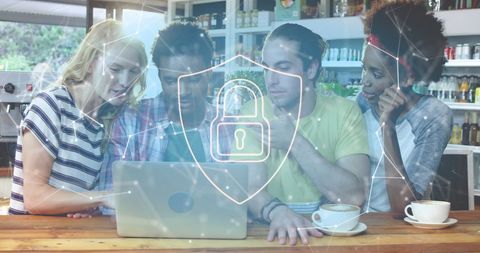 Diverse group discussing cybersecurity with digital shield overlay in cafe