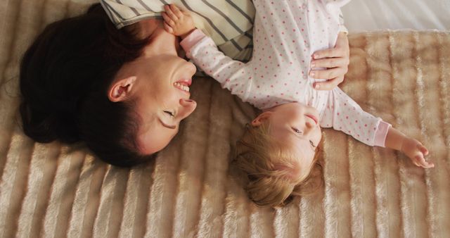 Joyful Mother and Baby Bonding at Home on Cozy Bed - Download Free Stock Images Pikwizard.com