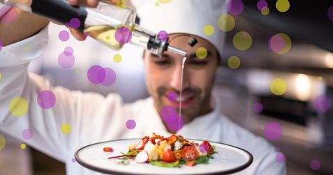 Chef dazzling plated dish in vibrant ambiance