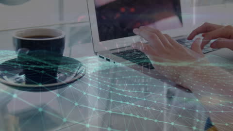 Hands Typing on Laptop with Digital Data Processing Overlay