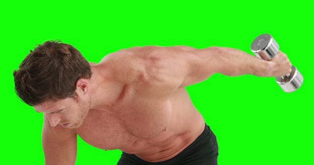 Muscular Man Working Out Lifting Dumbbell Against Green Screen - Download Free Stock Images Pikwizard.com