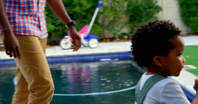 Father and Child Walking by Poolside, Summer Day - Download Free Stock Images Pikwizard.com