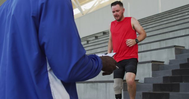 Amputee Athlete Exercising on Stairs with Coach Observation - Download Free Stock Images Pikwizard.com