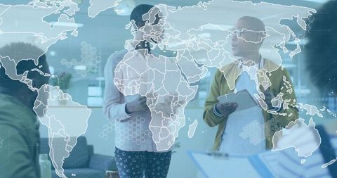 Diverse Professionals Collaborating with Digital World Map Overlay