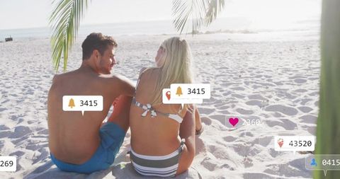 Couple Relaxing on Tropical Beach with Social Media Notifications