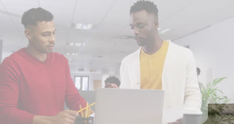 Teamwork in Modern Office with Diverse Professionals Collaborating