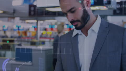 Businessman Analyzing Financial Data in a Modern Office