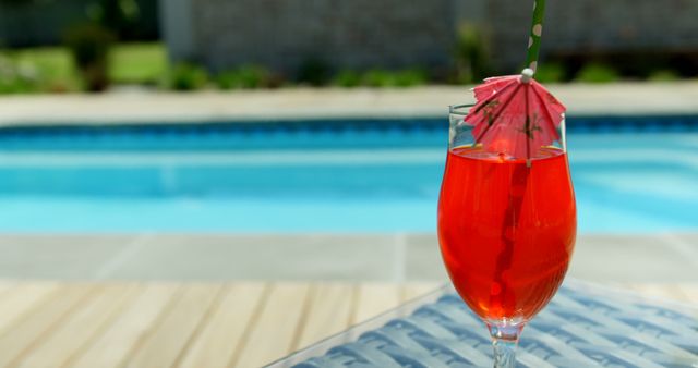 Refreshing Poolside Cocktail Drink with Umbrella Near Swimming Pool, Close View - Download Free Stock Images Pikwizard.com