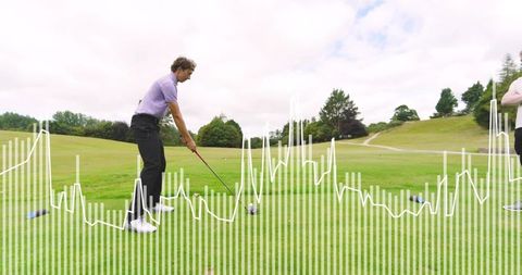 Male golfer preparing tee shot with driver and golf swing analytics overlay