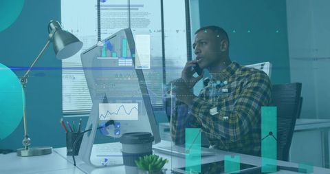 Office Professional Analyzing Financial Data on Desktop with Coffee