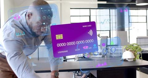 Businessman engaging digital banking technology in modern office