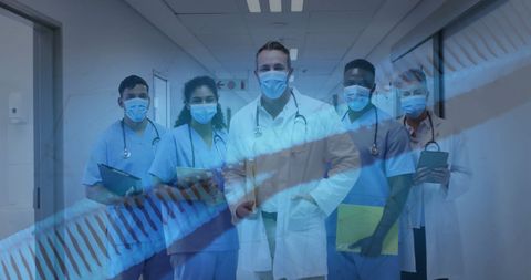 Diverse healthcare team with spinning dna strand overlay