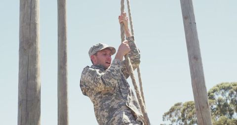 Soldier Climbing Down Rope in Outdoor Military Training - Download Free Stock Images Pikwizard.com