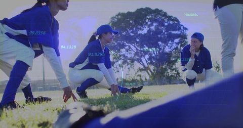 Female youth baseball team stretching on grass with sports analytics data overlays