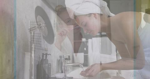 Women with skincare routine in modern bathroom interior