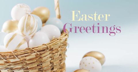 Easter greetings with gold and white eggs in basket