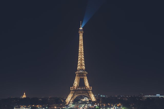 Eiffel Tower Illuminated at Night in Paris - Download Free Stock Photos Pikwizard.com