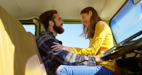 Youthful Couple Laughing Together on a Road Trip - Download Free Stock Images Pikwizard.com