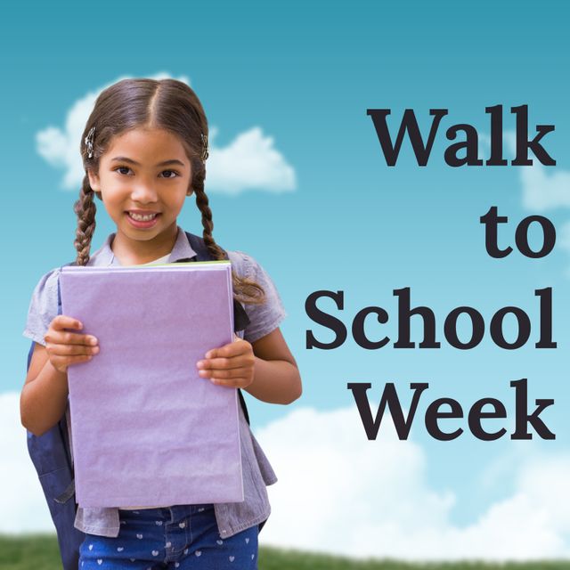 Young Asian girl with braids holding book against blue sky with clouds. Useful for promoting educational campaigns, Walk to School Week events, and child-friendly initiatives. Ideal for posters, flyers, social media content, and educational websites to encourage walking to school.