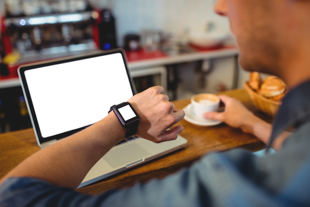 Transparent Technology Display Laptop Smartwatch and Coffee Moment - Download Free Stock Videos Pikwizard.com