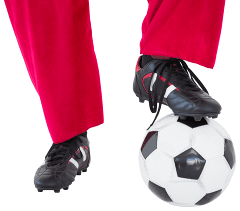 Santa claus kicking soccer ball with festive flair transparent background