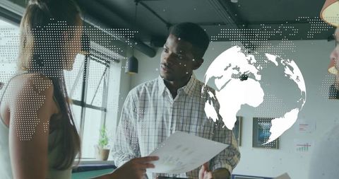 Collaborative Business Team Analyzing Global Market Data in Modern Office