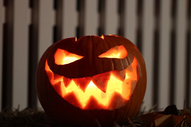 Glowing Jack-O'-Lantern with Spooky Smile - Download Free Stock Photos Pikwizard.com