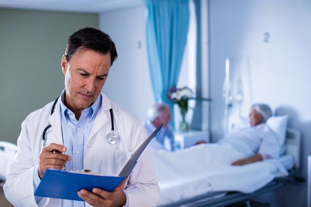 Male doctor reviewing a medical report in a hospital room with two elderly patients in the background. Ideal for use in healthcare, medical, and hospital-related content, including articles, brochures, and websites focused on medical care, patient treatment, and healthcare professionals.