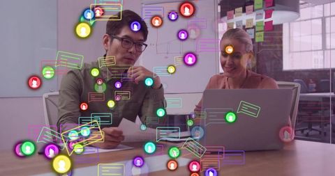 Diverse Professionals Collaborating with Digital Technology in Modern Office