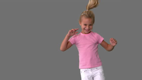 Joyful Girl Jumping Happily in Movement Captured