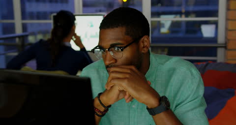 Focused Businessman Having Video Call in Modern Office