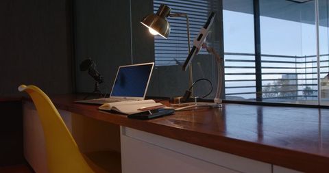 Modern Office Workspace Featuring Laptop and Technology Gadgets