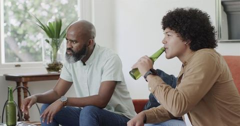Men socializing and enjoying one's company at home