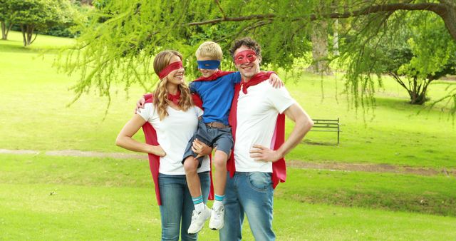 Happy Family Wearing Superhero Costumes in Park - Download Free Stock Images Pikwizard.com