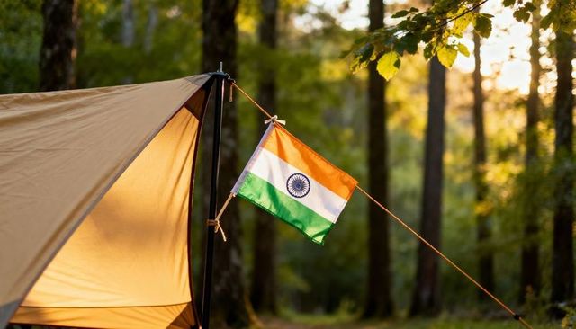 Indian tricolor flying from tent pole at sunlit forest campsite with guyline knot