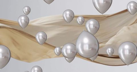 silver balloons floating over elegant gold and white background - Download Free Stock Images Pikwizard.com