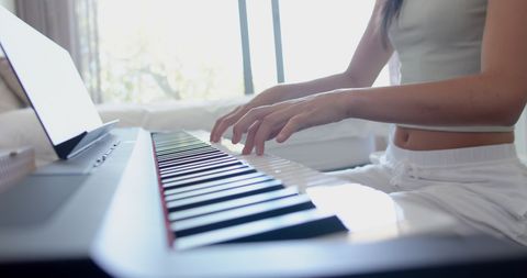 Teen Playing Digital Piano in Bright Home Interior - Download Free Stock Images Pikwizard.com