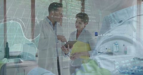 Medical Team Collaborating with Advanced Data Technology in Modern Lab