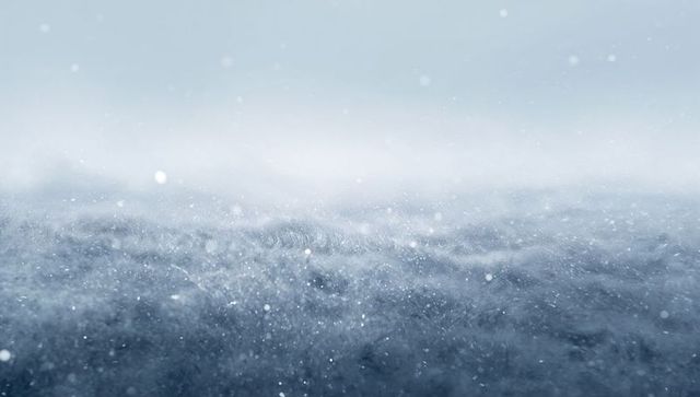 Wind-Sculpted Snow Plain with Blowing Flurries and Frost Haze for Winter Textures