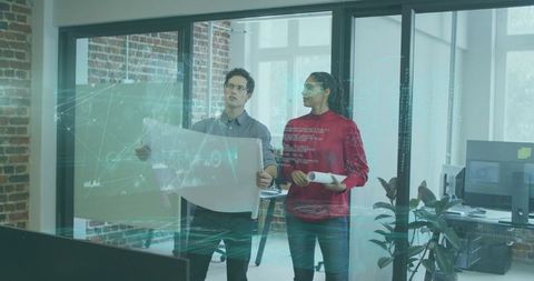 Innovative Designers Collaborating on Futuristic Interface