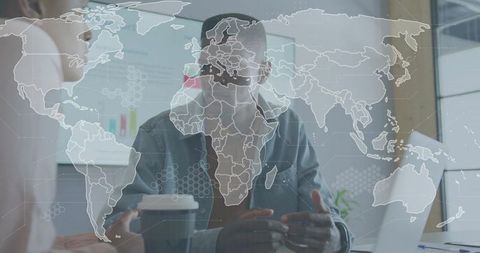 Gesturing business leader leading hybrid meeting with world map overlay and analytics