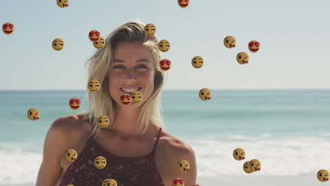 Smiling Woman on Beach with Floating Emojis