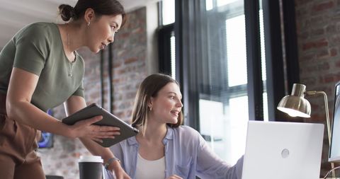 Mentorship in Modern Office Environment Fostering Collaboration - Download Free Stock Images Pikwizard.com