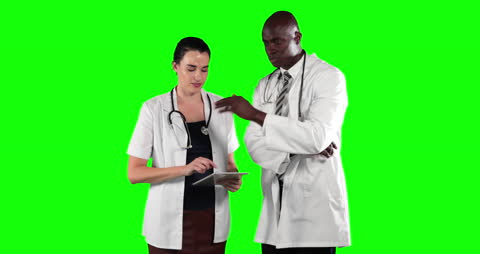 Medical Professionals Consulting with Tablet Green Screen
