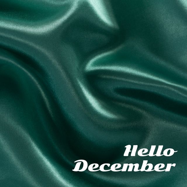 Luxurious shiny green background with 'Hello December' text is perfect for festive ads, holiday greetings, and social media posts. Use in invitations, digital banners, and newsletters welcoming the holiday season.