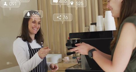 Barista Serving Customer Coffee in Trendy Café Setting