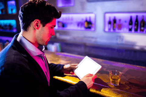 businessman holding transparent tablet at modern bar - Download Free Stock Videos Pikwizard.com