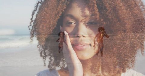 Double Exposure Portrait of Woman Touching Cheek Blending Seaside with Running Children